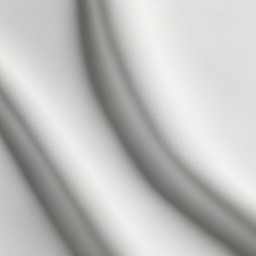 Close-up of fabric fibers undergoing nano-scale wrinkle-resistant coating application in laboratory